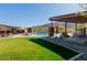 Community pool featuring ample seating, a grassy area and mountain views at 727 E Monte Way, Phoenix, AZ 85042