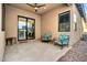 Relaxing outdoor patio with comfortable seating and ceiling fan at 727 E Monte Way, Phoenix, AZ 85042