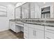 Bright bathroom with dual sinks, granite countertops, and ample storage space at 9624 E Twinkle Cir, Mesa, AZ 85212