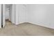 Unfurnished bedroom with carpet, closet, and an open door to hallway at 9624 E Twinkle Cir, Mesa, AZ 85212