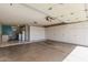 Spacious two-car garage equipped with built-in storage cabinets, providing ample space for vehicles and belongings at 10330 W Gulf Hills Dr, Sun City, AZ 85351