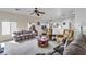 Bright and airy living room features a ceiling fan, neutral paint, and an open layout at 1054 E Desert Springs Way, San Tan Valley, AZ 85143