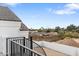 Balcony view showcasing the surrounding neighborhood and distant mountain views at 12218 N 104Th St, Scottsdale, AZ 85260