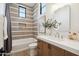 Stylish bathroom featuring modern fixtures, a soaking tub, and elegant design at 12218 N 104Th St, Scottsdale, AZ 85260