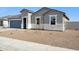 Charming single-story home featuring a two car garage and neutral colored stucco at 12398 E Bahia Ct, Florence, AZ 85132