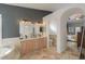 Bathroom features a double vanity, soaking tub, and plenty of natural light at 15076 W Belmont Dr, Casa Grande, AZ 85194