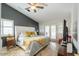 Cozy bedroom boasts natural light, white shutters, and french doors at 15076 W Belmont Dr, Casa Grande, AZ 85194