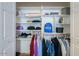 Organized walk-in closet featuring multiple shelves and hanging rods for optimal storage space at 15076 W Belmont Dr, Casa Grande, AZ 85194