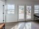 Living room with natural light coming in from large windows and doors at 15076 W Belmont Dr, Casa Grande, AZ 85194