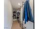 Walk-in closet with metal shelving for storage and hanging clothing at 15076 W Belmont Dr, Casa Grande, AZ 85194