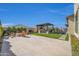 Spacious backyard with a fire pit, seating, and grill area perfect for outdoor entertaining and relaxation at 1957 W Lonesome Trl, Phoenix, AZ 85085
