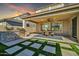 Spacious covered patio with a built-in grill and dining set for outdoor enjoyment at 1957 W Lonesome Trl, Phoenix, AZ 85085