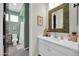 Stylish bathroom featuring a vanity, double sinks, and decor at 1957 W Lonesome Trl, Phoenix, AZ 85085