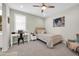 Bedroom featuring a work station, desk, chair, and decor at 1957 W Lonesome Trl, Phoenix, AZ 85085