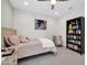 Comfortable bedroom featuring soft textures, a bookshelf and cozy decor at 1957 W Lonesome Trl, Phoenix, AZ 85085