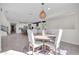 Elegant dining area with a round table and stylish chairs, perfect for Gathering meals at 1957 W Lonesome Trl, Phoenix, AZ 85085