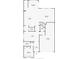Detailed floorplan showcasing the layout of the home's main level, including the kitchen, living room, and garage at 1957 W Lonesome Trl, Phoenix, AZ 85085