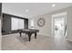 Spacious game room with a pool table and stylish decor at 1957 W Lonesome Trl, Phoenix, AZ 85085