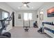 Home gym offering stationary bicycle and weight training equipment at 1957 W Lonesome Trl, Phoenix, AZ 85085