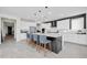Open-concept kitchen with a large island and seating at 1957 W Lonesome Trl, Phoenix, AZ 85085