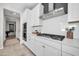 Bright kitchen with stainless steel range hood and modern appliances at 1957 W Lonesome Trl, Phoenix, AZ 85085