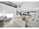 Bright and airy living room features high ceilings and an open floor plan with modern decor at 1957 W Lonesome Trl, Phoenix, AZ 85085