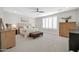Serene main bedroom with a plush bed, neutral tones, and ample natural light at 1957 W Lonesome Trl, Phoenix, AZ 85085