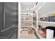 Organized pantry with ample shelving and storage space at 1957 W Lonesome Trl, Phoenix, AZ 85085