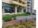 Well-maintained landscaping at the entrance to Executive Towers at 207 W Clarendon Ave # B22, Phoenix, AZ 85013