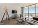Inviting living room with large windows and a scenic balcony view, perfect for relaxation at 207 W Clarendon Ave # B22, Phoenix, AZ 85013