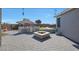 Entertaining backyard with fire pit, outdoor kitchen, patio, BBQ, and sitting area at 22805 W Hopi St, Buckeye, AZ 85326