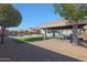 Spacious backyard with gazebo, outdoor seating, in-ground pool and rock landscaping features at 22805 W Hopi St, Buckeye, AZ 85326