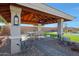 Relaxing gazebo includes ceiling fan, lighting, and TV at 22805 W Hopi St, Buckeye, AZ 85326