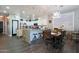 Bright kitchen with subway tile backsplash, granite counters, and a large island at 22805 W Hopi St, Buckeye, AZ 85326
