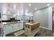 Open kitchen featuring white cabinets, granite countertops, and stainless steel appliances at 22805 W Hopi St, Buckeye, AZ 85326