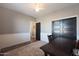 This office features white and gray wainscoting and a dark wood desk at 22805 W Hopi St, Buckeye, AZ 85326