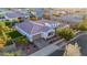 Charming desert home boasts a beautiful yard and solar panels at 3005 E Valencia Dr, Phoenix, AZ 85042