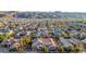 Expansive desert home boasts a tile roof and a view of the mountains at 3005 E Valencia Dr, Phoenix, AZ 85042