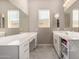 Bright bathroom with dual sinks, ample counter space, and plenty of cabinet storage at 3005 E Valencia Dr, Phoenix, AZ 85042