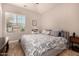 Comfortable bedroom with a neutral color palette and plenty of natural light at 3005 E Valencia Dr, Phoenix, AZ 85042