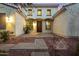 Beautiful home exterior featuring desert landscaping, a paver walkway, and an inviting entrance at 3005 E Valencia Dr, Phoenix, AZ 85042