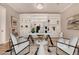 Home office featuring a large desk, shelving, and decorative accents in a well-lit space at 3005 E Valencia Dr, Phoenix, AZ 85042