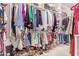 Spacious walk-in closet with ample storage for clothes and shoes at 3005 E Valencia Dr, Phoenix, AZ 85042