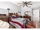 Inviting bedroom with vaulted ceiling, ceiling fan, wood-look floors, and a relaxing atmosphere at 3403 E Kristal Way, Phoenix, AZ 85050