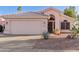 Charming single-story home featuring desert landscaping and a two-car garage at 3403 E Kristal Way, Phoenix, AZ 85050