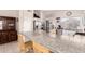 Bright kitchen featuring granite countertops, stainless steel appliances, and plenty of natural light at 3403 E Kristal Way, Phoenix, AZ 85050