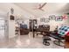 Inviting living room with tile floors, vaulted ceiling, and comfortable seating at 3403 E Kristal Way, Phoenix, AZ 85050
