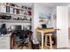 Bright office area with built-in shelves, desk space, and ample storage for productivity at 3403 E Kristal Way, Phoenix, AZ 85050