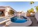 Inviting backyard pool with patio, palm trees, and a sense of privacy for relaxation at 3403 E Kristal Way, Phoenix, AZ 85050