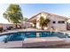 Backyard pool and covered patio, perfect for relaxing and enjoying outdoor living at 3403 E Kristal Way, Phoenix, AZ 85050